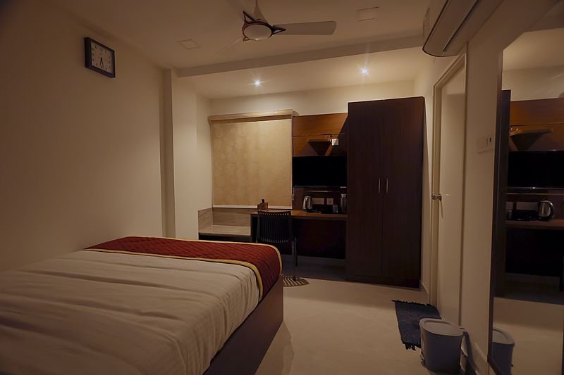 Work desk and television in a guest room at SRK Clasic