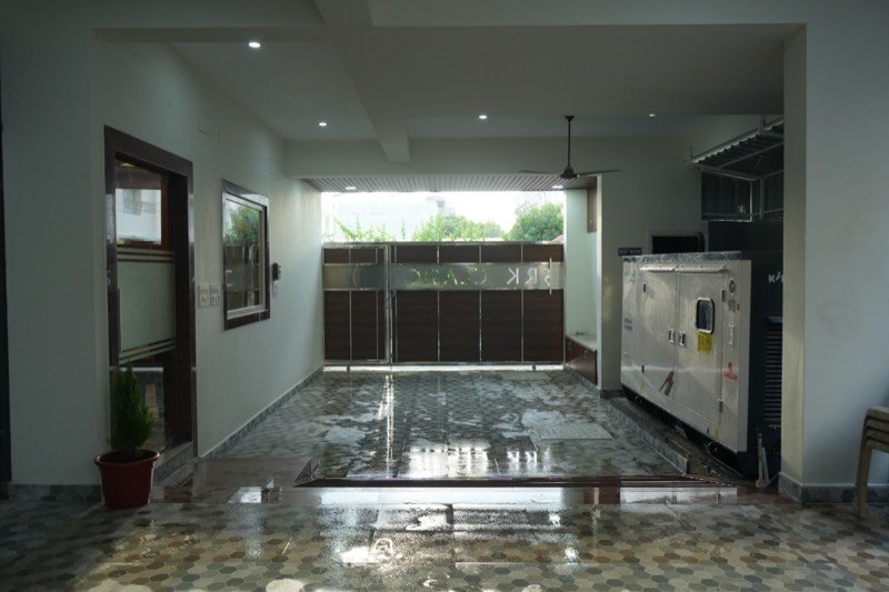 Ground-floor parking and entrance gate at SRK Clasic